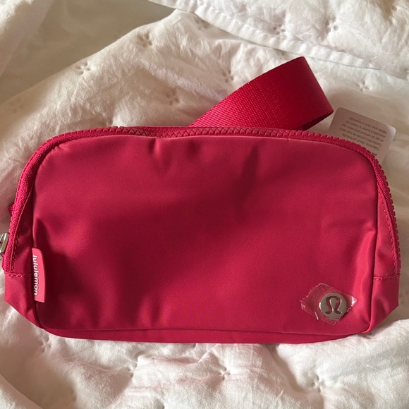 lululemon athletica Handbags - Lululemon Pink Crossbody Belt Bag